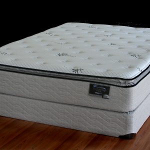 A mattress with an unmade bed in the middle