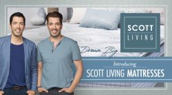 A man standing in front of a sign that says " scott living mattress."